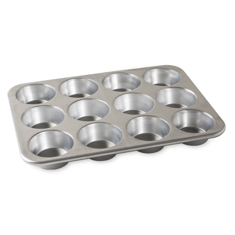 Nordic Ware's top-rated NaturalsĀ® Bakeware collection is made of pure aluminum for superior heat conductivity and produces consistent evenly browned baked goods every time. These premium pans are designed for lifetime durability and will not rust. Encapsulated galvanized steel rims prevent warping. Creativity meets natural aluminum sustainability. Serve up something special with this eco-friendly solution that doesn't skimp on performance