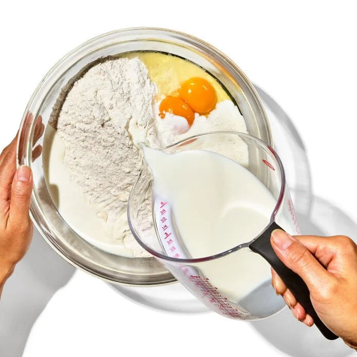 Measure with a smile, not a backache. Our OXO Good Grips 4-Cup Angled Measuring Cup is like having X-ray vision—just peek down and voilà, perfect measurements! This clever cup (a Good Housekeeping darling!) features a sneaky angled interior that displays cups, ounces, and milliliters from above like magic.