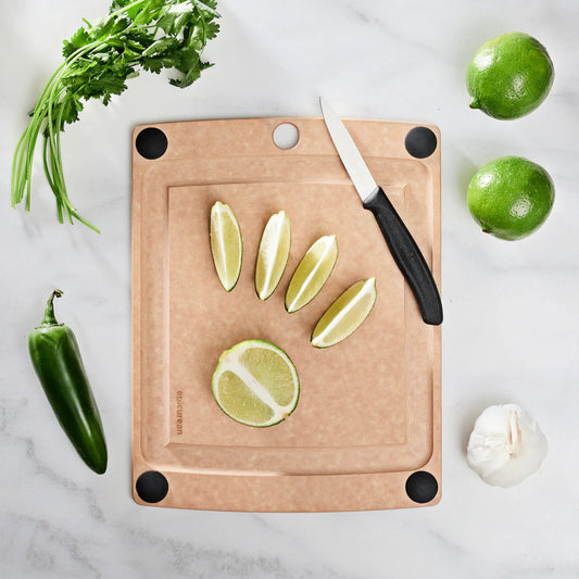 From meal prep to plating, the Epicurean All-in-One Cutting Board (11.5" x 9") is your versatile kitchen go-to. Designed for convenience, it features a juice groove on one side to catch excess liquids and a flat surface on the other for extra workspace. Non-slip silicone feet keep the board steady while you chop, slice, and dice with confidence.
