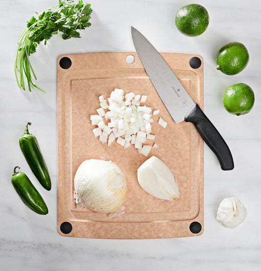 Prep like a pro with the Epicurean All-in-One Cutting Board (14.5" x 11.25"), thoughtfully designed to handle everyday cooking with ease. Featuring a built-in juice groove on one side and a smooth flat surface on the other, it’s ready for everything from carving roasts to chopping veggies