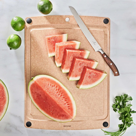Meet your new go-to for big kitchen jobs—the Epicurean All-in-One Cutting Board in an extra-generous 19.5" x 14.5" size. Designed with convenience in mind, this board features a built-in juice groove on one side and a flat, full-surface reverse for maximum versatility.