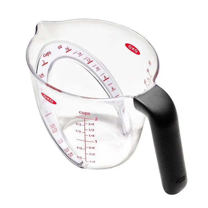 No more awkward neck-craning to check measurements! The OXO Good Grips 2-Cup Angled Measuring Cup is your kitchen superhero, making everything from fancy cocktails to zesty dressings a breeze. The genius is in the design—just peek down into the cup to read measurements instantly!