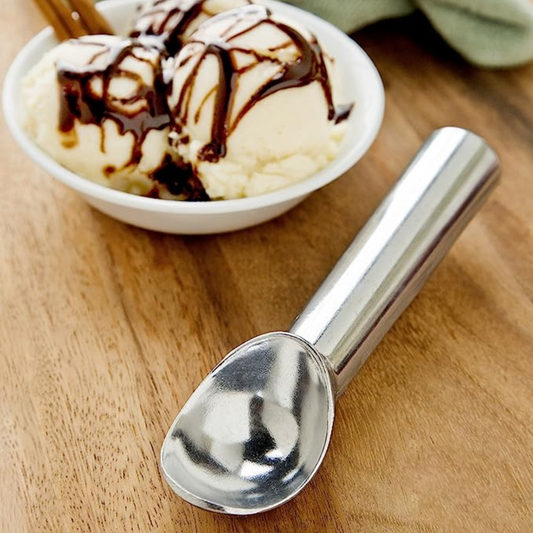 Calling all ice cream lovers! Get to enjoying your favorite flavor faster and easier than ever with this Anti-Stick Ice Cream Scoop! Constructed of durable, heavy-duty aluminum, this tool features a unique liquid-filled handle, designed to keep the ice cream from sticking. Before using, simply place the scoop under hot water to warm for anti-stick use!