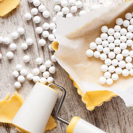 Mrs. Anderson's Ceramic Pie Weights keep empty pie shells from shrinking, bubbling, and buckling during the blind baking process.