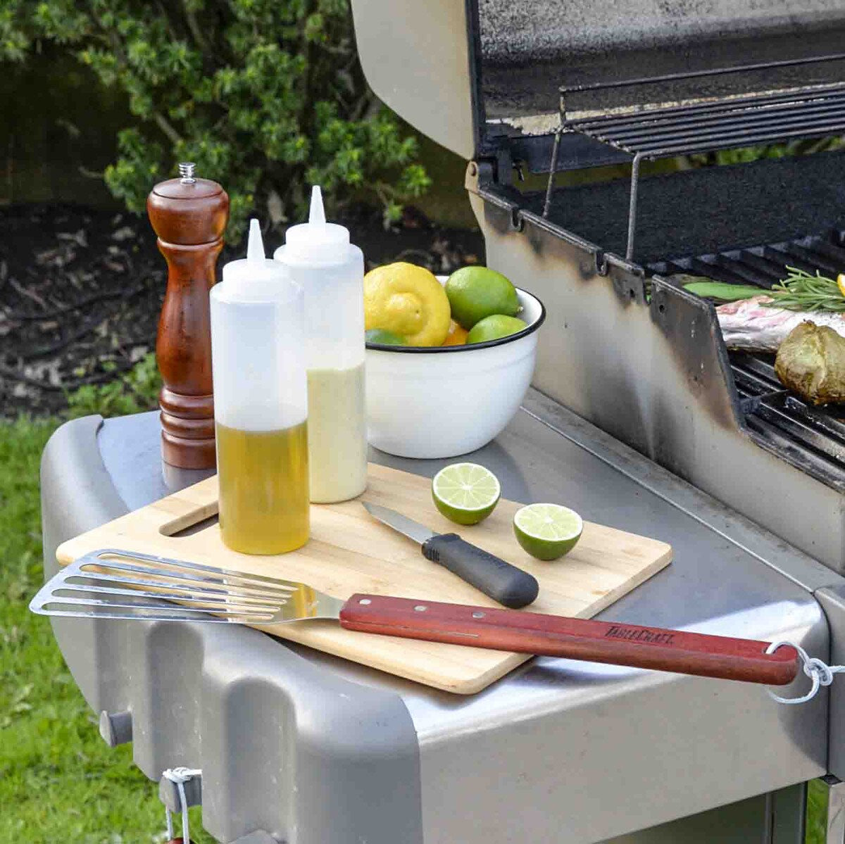 Crafted from durable bamboo, its natural wood tones offer a sleek, modern look while providing a sturdy surface for chopping, slicing, and dicing. Perfect for everyday meal prep or serving cheeses and crudités, this board combines functionality with timeless elegance.