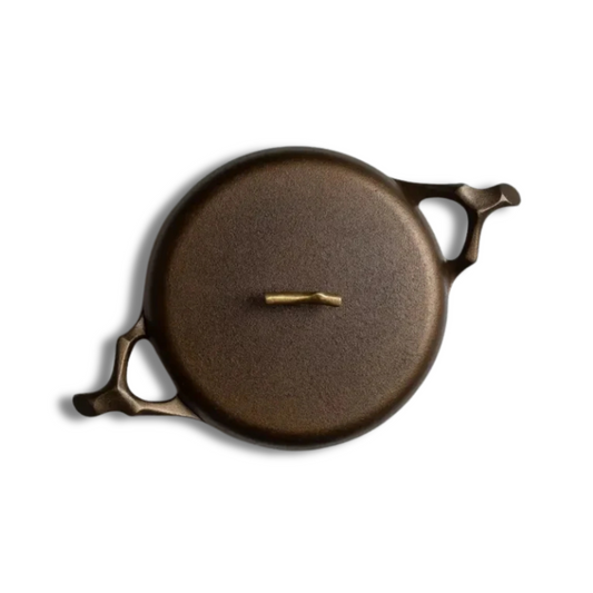 This gorgeous 12" braising pan comes with two handles, since we know heavy iron cookware deserves to be held with ease and assurance.