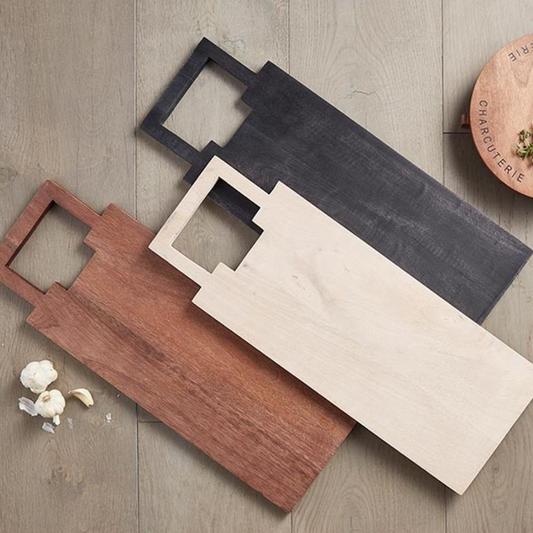 Present your favorite desserts and appetizers in style with our Charcuterie Board featuring a sleek black classic mango wood design and a convenient handle. Crafted for elegance and functionality, this board offers a sophisticated backdrop for showcasing an array of cheeses, meats, fruits, and more. Perfect for entertaining or daily use, it combines versatility with a modern aesthetic to elevate your dining experience.