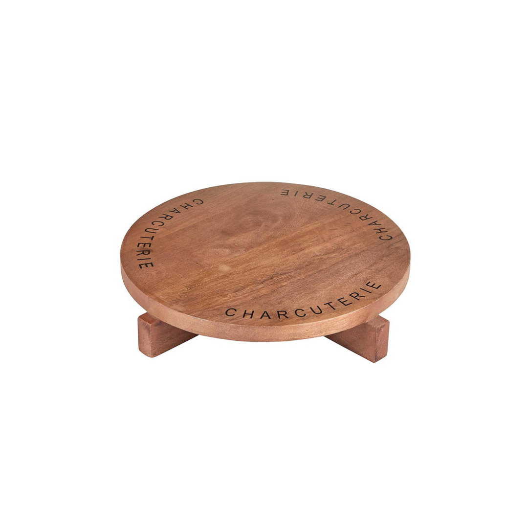 Crafted from mango wood with a stylish footed base and the word "charcuterie" elegantly etched around the top. This board is not just a serving piece but a statement of culinary sophistication. Perfect for presenting an assortment of cheeses, cured meats, fruits, and nuts, it adds a touch of rustic charm to any dining occasion. Ideal for entertaining or everyday use, this versatile board enhances your table setting with its natural beauty and practical design.