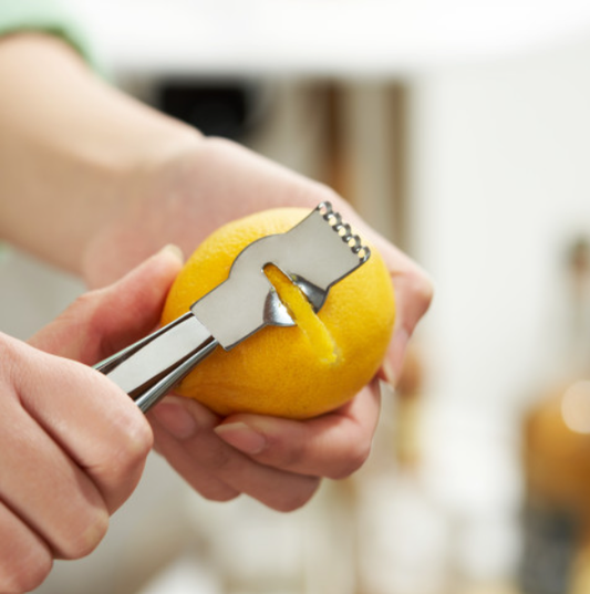 This essential tool for any cocktail enthusiast or home bartender features sharp stainless steel blades perfect for zesting citrus fruits like lemons, limes, and oranges.