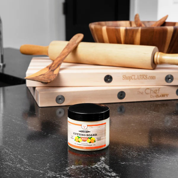 Clark's cutting board wax on counter with wood products