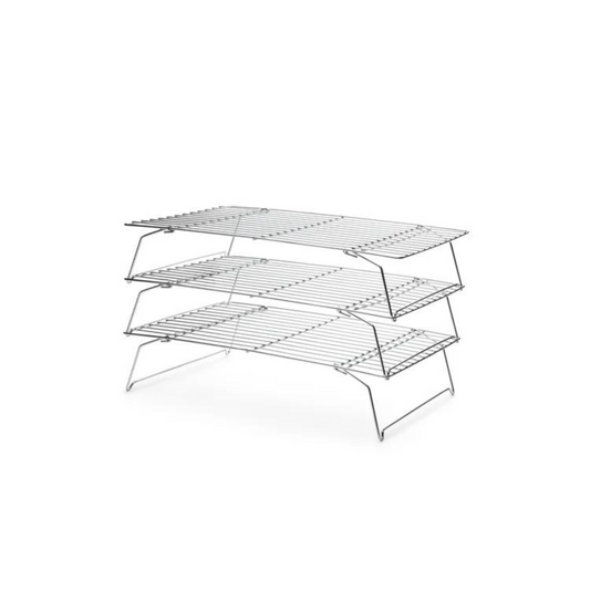 A baker's essential. End the baking process profoundly by placing your fresh-out-of-the-oven cookies, cakes, and breads on these Stackable Cooling Racks. Made of durable, lightweight chrome, this set includes 3 stackable cooling grids, which will elevate your baked goods for uniform cooling and nice, crisp undersides. Perfect when baking a large amount of cookies or when counter space is limited.