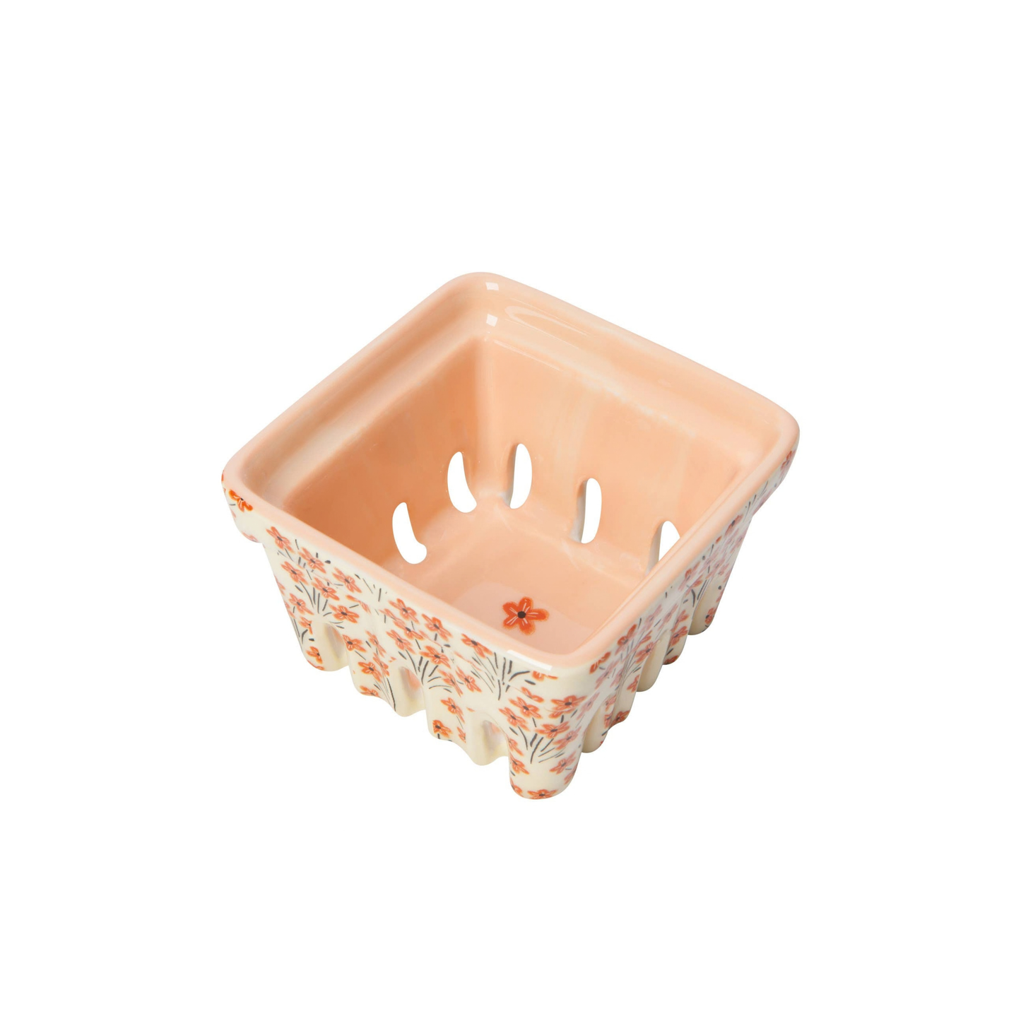 Ceramic basket with floral pattern on a white background