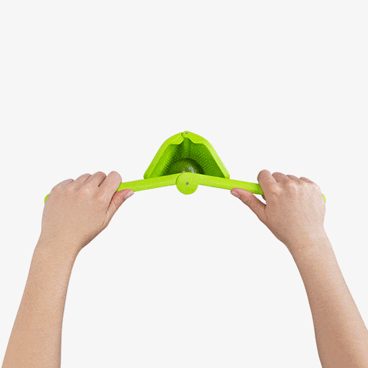 Fluicer in green is the ultimate citrus juicer that folds and stores easily. Its hinged design reduces effort and includes a pip catcher for precise juice flow. Smallest Fluicer in the family made for limes.