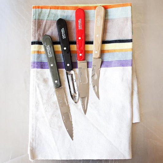 Includes - paring knife, vegetable knife, serrated paring knife, and stationary peeler. Material - Stainless Steel, Wood