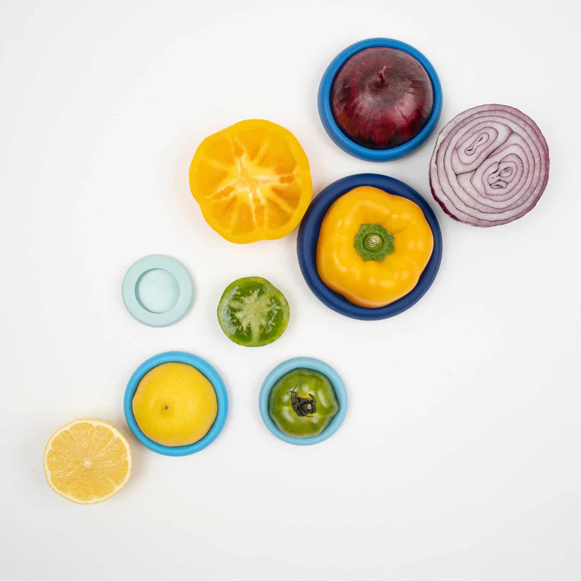 Say goodbye to wasted produce with Ice Blue Food Huggers! This set of five flexible, reusable silicone covers keeps your fruits and veggies fresher for longer while also fitting over jars, open cans, and other small containers.