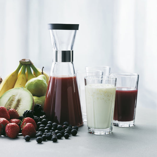 This sleek, minimalist design, complete with a chic stainless steel collar, is the perfect way to serve ice-cold water with a twist—add fresh mint, citrus slices, or frozen berries for a refreshing upgrade. Whether it’s for a casual meal or a formal dinner, this stylish carafe blends seamlessly with any tableware or cutlery, making it a versatile and practical addition to your collection.