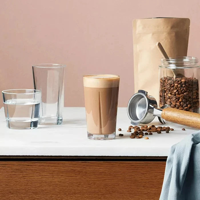 Made from tempered lead-free glass, these tall, simple café glasses are perfect for everything from your morning coffee to an indulgent moment with a hot chocolate, latte, or tea. Whether you're sipping a cozy drink or serving up a little indulgence, these tumblers elevate every moment.