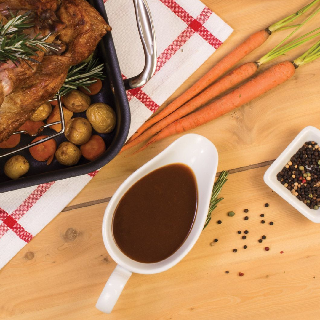 8 ounce porcelain white gravy boat with serving dish.
