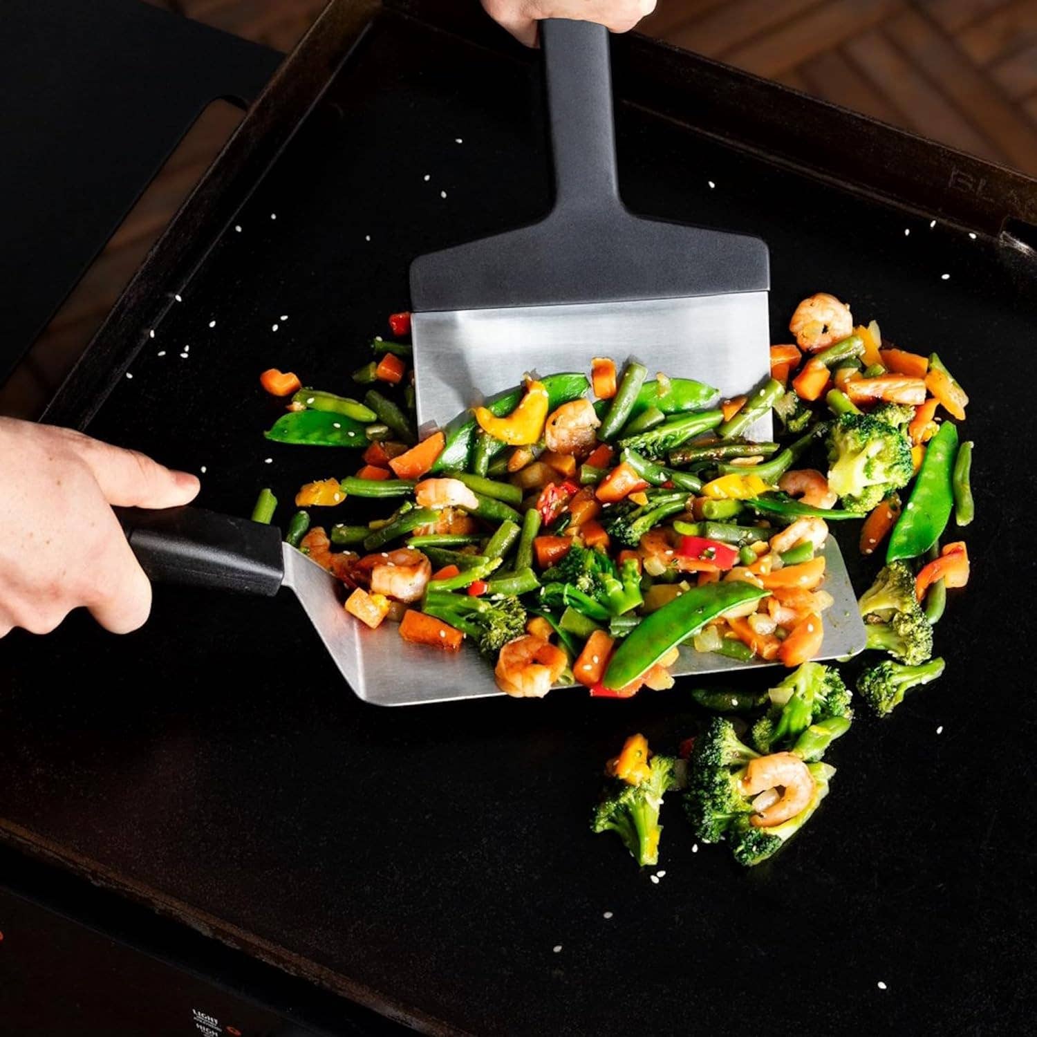 The Stainless Steel Griddle Scraper makes cleaning effortless with its beveled edge, designed to cut through grease and grime with ease. Constructed from durable stainless steel, it withstands tough jobs and frequent use.