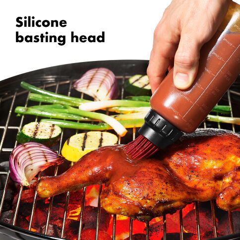 Master the art of grilling with the OXO Good Grips Basting Bottle! Its innovative silicone head with flow-control valve handles sauces of any consistency, while the smart drip-catching collar keeps your hands clean.