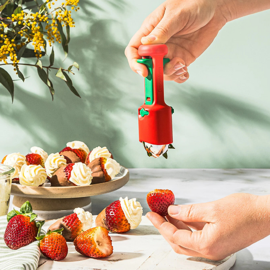 Meet the Dreamfarm Hullapit—the ultimate 3-in-1 fruit tool that makes hulling, pitting, and prepping a total breeze! This clever gadget effortlessly hulls strawberries, removes pineapple eyes, and pits cherries and olives with one smooth motion—catching the mess before it splatters. Its conically tapered stainless steel blades ensure precise hulling with minimal waste, while the spring-loaded plunger quickly removes pits of all sizes.