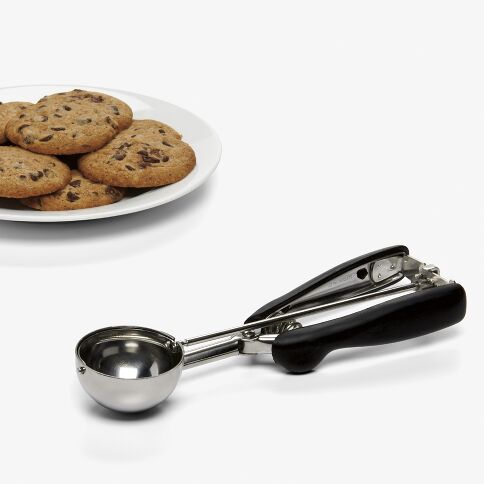 Meet the cookie monster's favorite tool - our Large Cookie Scoop! This size 20 portioner is the superhero of consistent cookie creation, making scooping and shaping as fun as eating the finished product!