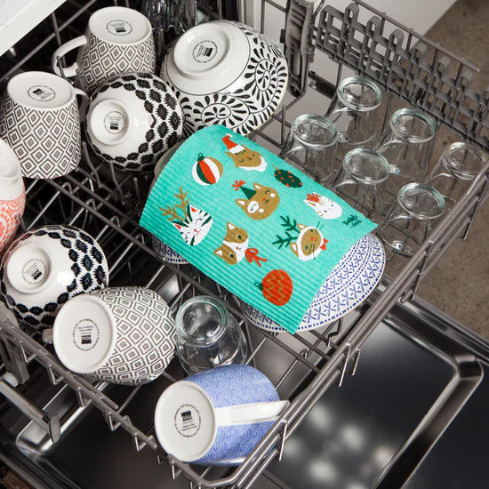 Let the charm of a playful clowder of cats spice up your cleaning routine with the Let it Meow Swedish Sponge Cloth by Ecologie!
