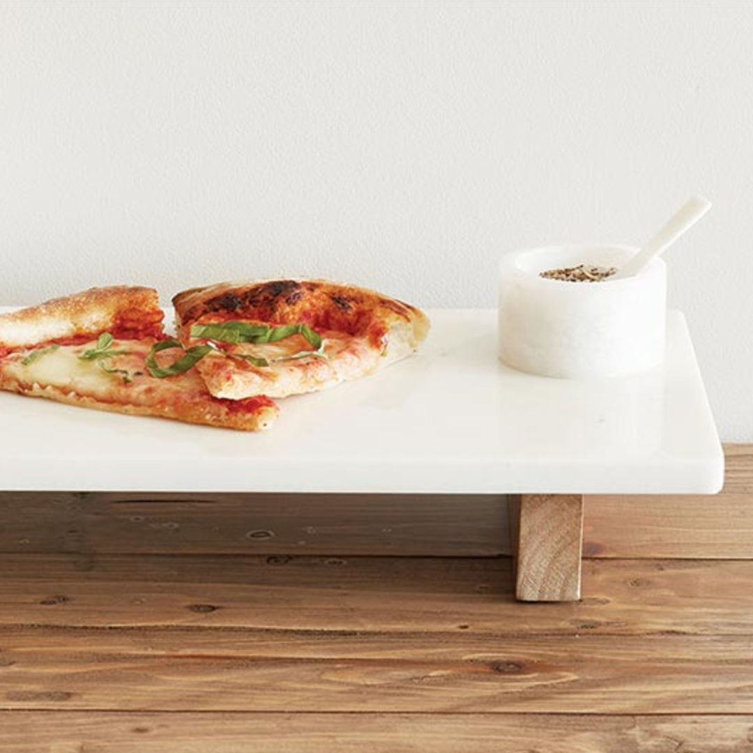 Are you a culinary enthusiast looking for a stunning yet practical addition to your kitchen and dining experience? Our Marble and Wood Board with Feet combines the timeless beauty of marble with the warmth of wood to create a functional masterpiece that will transform your cooking and serving endeavors.