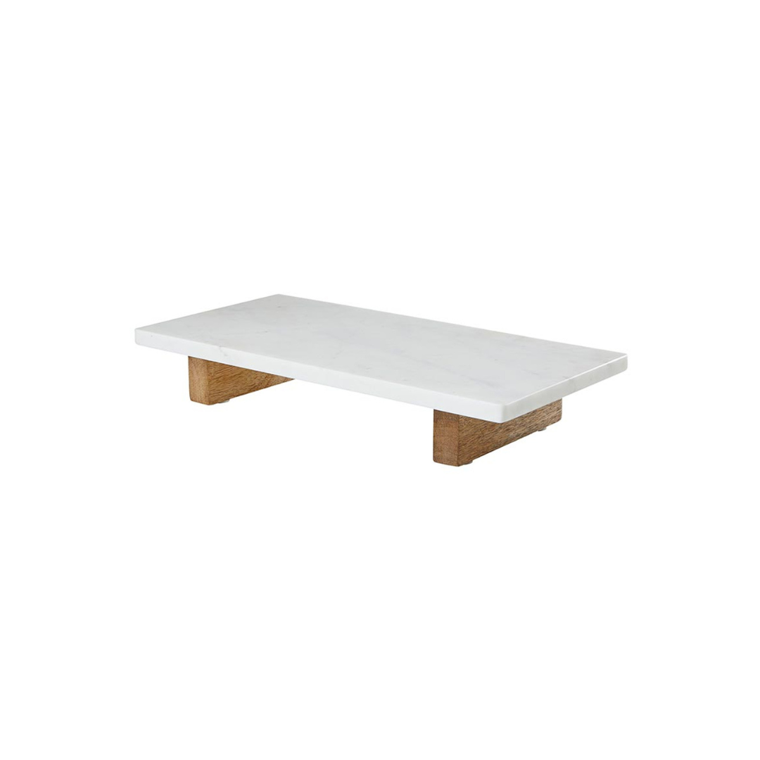Are you a culinary enthusiast looking for a stunning yet practical addition to your kitchen and dining experience? Our Marble and Wood Board with Feet combines the timeless beauty of marble with the warmth of wood to create a functional masterpiece that will transform your cooking and serving endeavors.