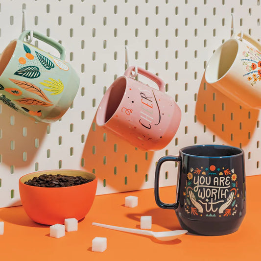 the Mega Mug in Cheers is a charming 22 oz stoneware mug that keeps your beverage as warm as the conversation!