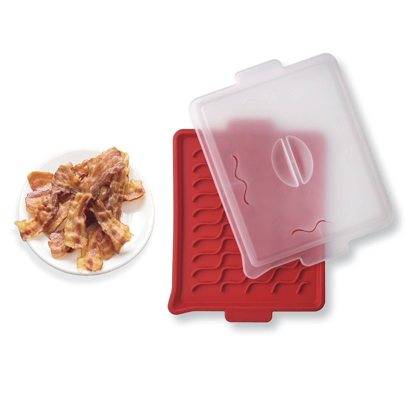 Red and clear silicone bacon cooker with cooked bacon on a white background