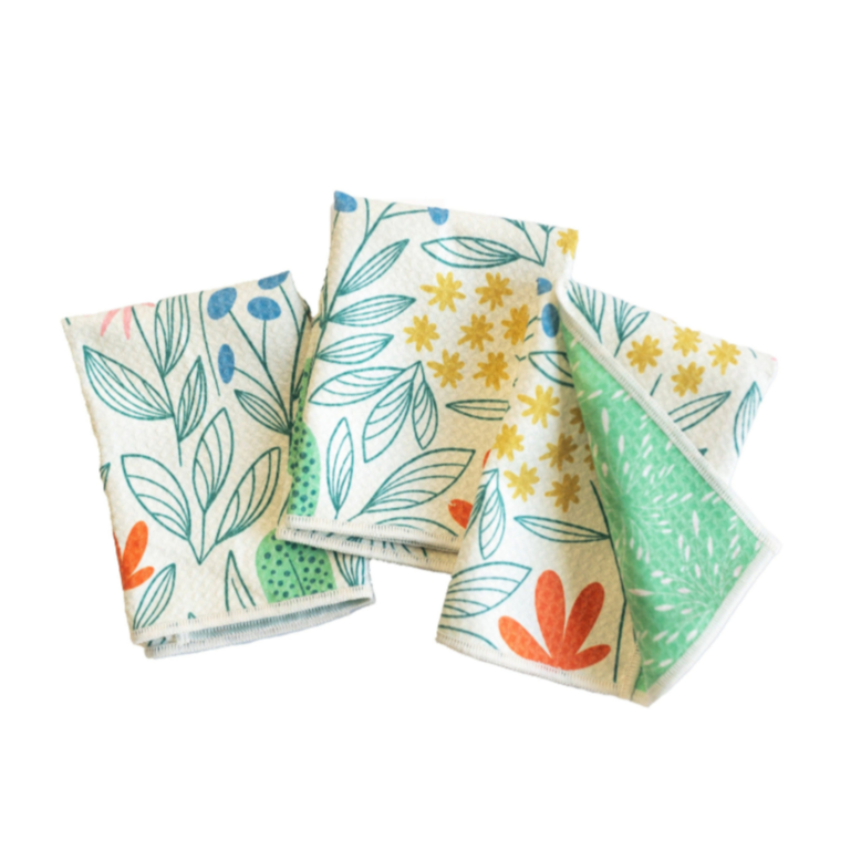 Behold the New Bloom Collection! Imagine a smooth cream canvas adorned with a fresh Scandinavian-inspired print featuring bold red, yellow, and pink flowers. It's like a ray of sunshine in your home.