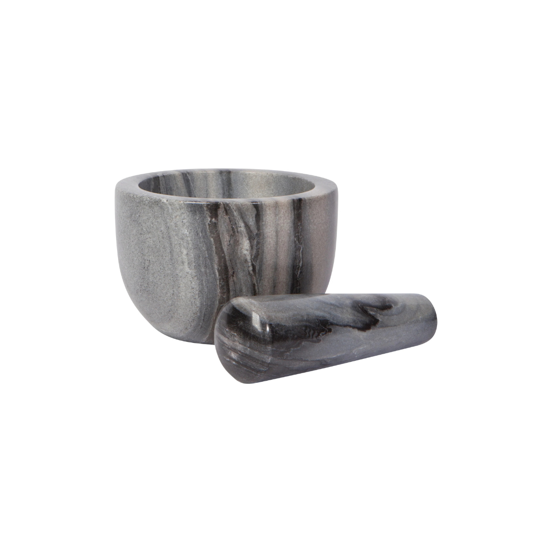 Elevate your kitchen with the timeless beauty and functionality of this Silver Clean Marble Mortar & Pestle. Crafted from cool, sleek marble, each piece is unique, featuring natural variations in slate, white, pink, or onyx hues. The weight of the marble and the ergonomic fit of the pestle make grinding seeds, spices, and herbs effortless, while the non-porous surface ensures flavors remain pure and uncompromised.