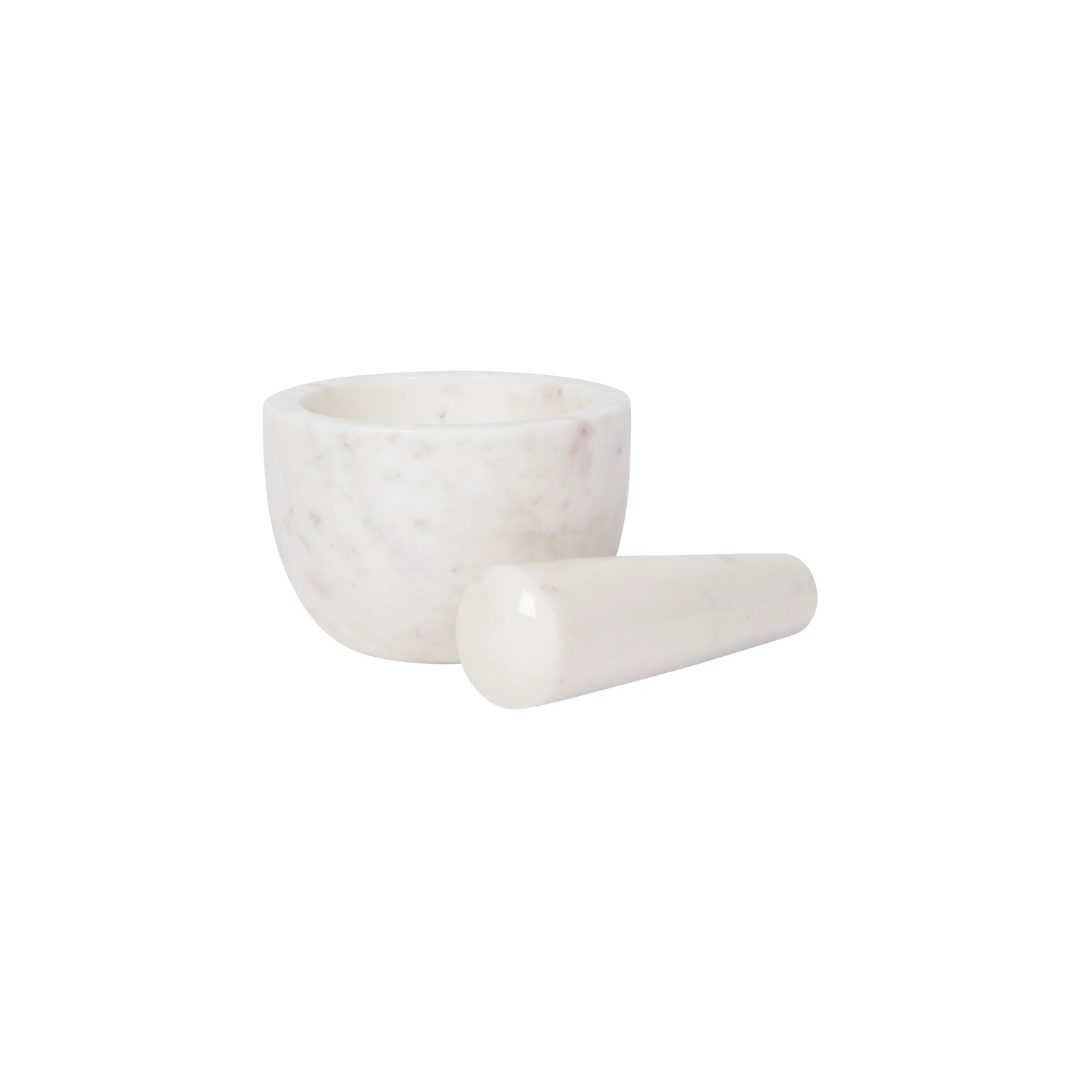 Elevate your kitchen with the timeless beauty and functionality of this White Clean Marble Mortar & Pestle. Crafted from cool, sleek marble, each piece is unique, featuring natural variations in white with touches of slate. The weight of the marble and the ergonomic fit of the pestle make grinding seeds, spices, and herbs effortless, while the non-porous surface ensures flavors remain pure and uncompromised.