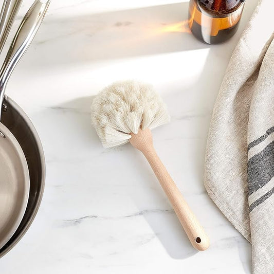 100% Natural Horsehair Fiber Dish Brush with Untreated Beechwood Handle gentle enough for delicate stemware. Brush measures 9" long. Clean bristles with lukewarm water, towel blot to remove excess moisture and air dry with bristles facing down to prevent damage to wood.