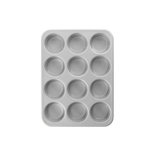 Metal muffin tin with 12 compartments on a white background