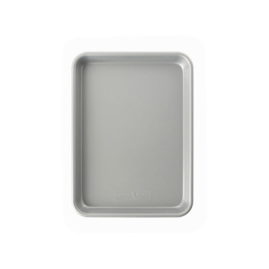 Silver baking tray on a white background