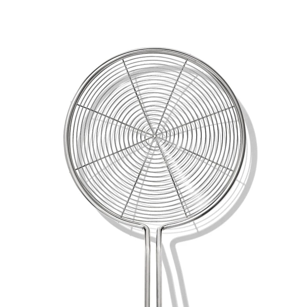 Metal strainer on a white background