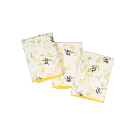 Three kitchen towels with bee and floral pattern on a white background