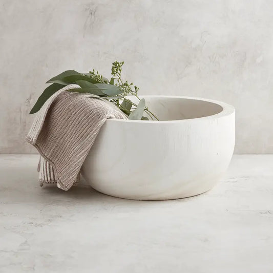 The Paulownia Wood Serving Bowl is the perfect addition to any home. Great for serving food or creating a beautiful centerpiece. Available in white to seamlessly fit into any home. This bowl is sure to add a touch of style to your next gathering!