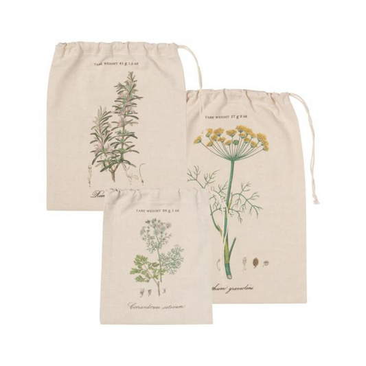 3-Piece Garden Herbs Produce Bags from Now Designs by Danica! These charming, washable bags feature beautiful illustrations of dill, rosemary, and coriander, complete with their fancy Latin names, bringing a touch of rustic charm to your shopping routine.
