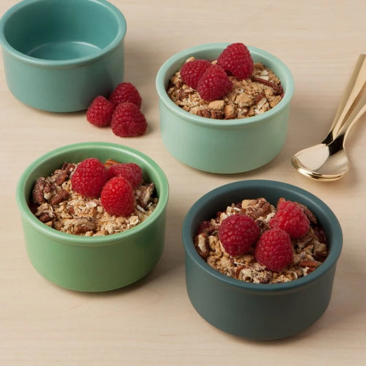 Set of four ombre style green colored ramekins that hold six ounces each. Microwave, dishwasher, and oven safe up to 450 degrees. Perfect for desserts and small cooking and baking needs!