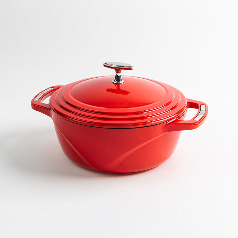 4.5 Qt Enamel Dutch Oven in bold red combines timeless American design with lasting durability. Featuring stainless steel inlaid handles and hardware, along with a smooth, non-reactive enameled cast iron surface, this versatile kitchen essential is perfect for braising, boiling, roasting, and deep-frying.