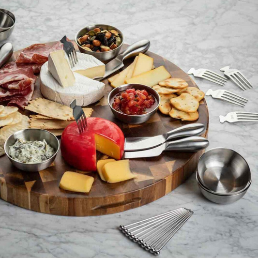 Outfit your next charcuterie or appetizer board with this collection of simple yet sophisticated Serving Bowls, set of 8. Organize nuts, small crackers, delicate cheeses, sauce, dips and more with these bowls, arranged around one of our many serving boards or paddles. Stainless steel makes them a durable and reusable solution to apps and dips service. Create the ultimate appetizer spread that will wow your guests with ease.