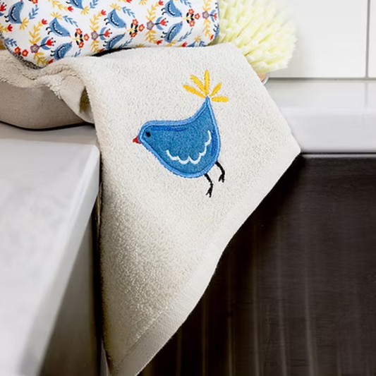 This rugged scrubber tackles the toughest baked-on grime with ease, thanks to its tough scrubber side and super-absorbent ridged terry cloth front. Measuring a generous 12" x 12" and hemmed on all sides for durability, Scrubsy offers the best of both worlds: heavy-duty scrubbing and gentle care for non-stick surfaces. It’s machine washable and ready for repeated use, making kitchen clean-up a breeze.