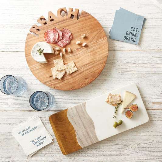 Take entertaining to the next level with this Marble and Wood Serving Board. Handcrafted so each piece is unique in detail. The perfect way to display your favorite treats, savory selections or add a touch of elegance to any room décor.