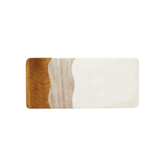 Take entertaining to the next level with this Marble and Wood Serving Board. Handcrafted so each piece is unique in detail. The perfect way to display your favorite treats, savory selections or add a touch of elegance to any room décor.