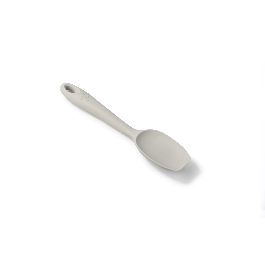 Meet your new kitchen essential—the Silicone Spoonula in Coastal Grey! This clever hybrid of a spoon and spatula is designed for ultimate versatility, making stirring, scraping, mixing, and baking a breeze.
