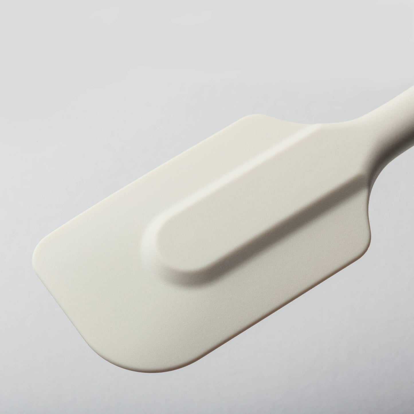 The 10" Coastal Cream Silicone Spatula by Zeal is your go-to kitchen sidekick for stirring, scraping, mixing, and baking with ease. Designed with an ergonomic handle and a handy hanging loop for effortless storage, this spatula features a flexible yet durable non-scratch silicone head that’s safe for all non-stick surfaces.