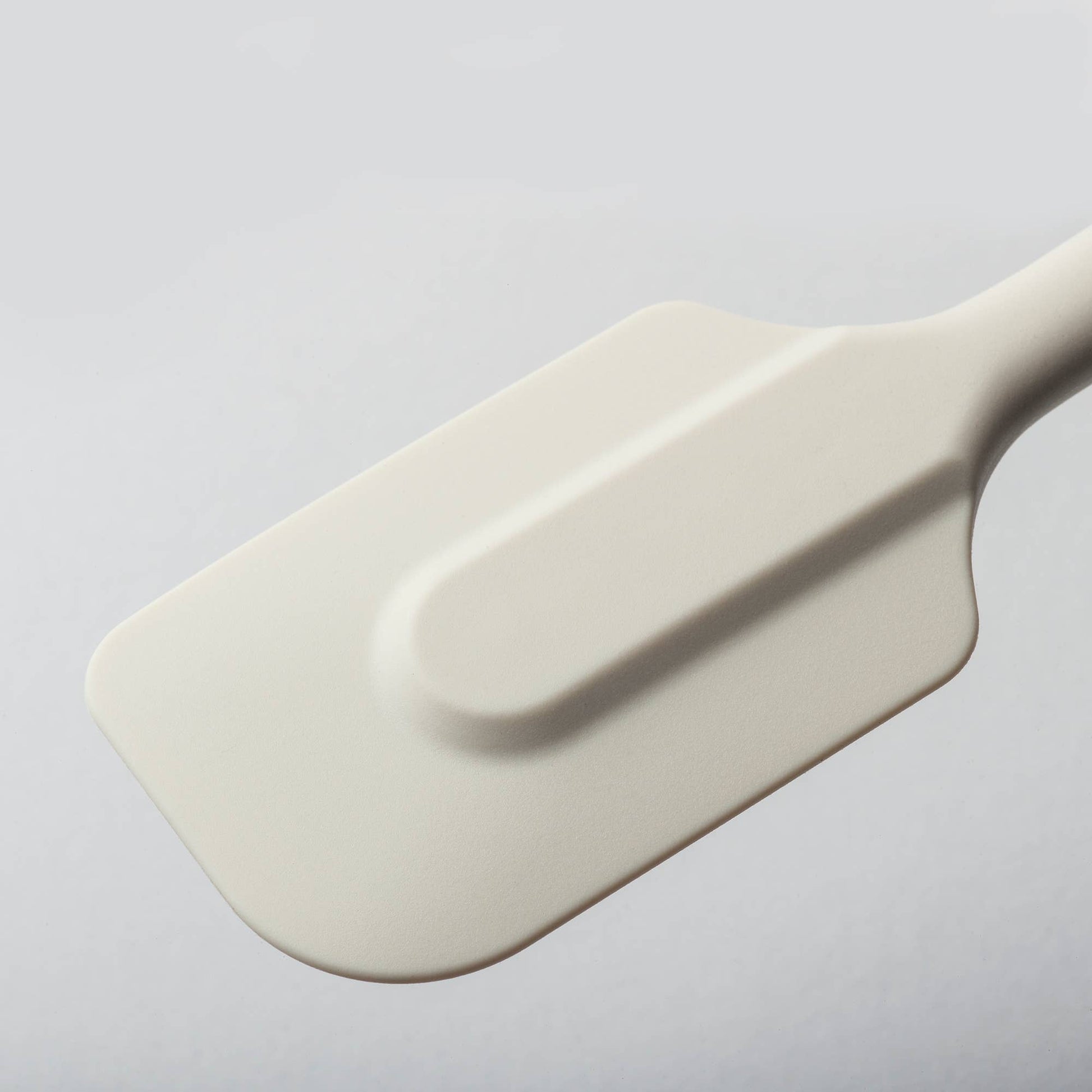 The 10" Coastal Cream Silicone Spatula by Zeal is your go-to kitchen sidekick for stirring, scraping, mixing, and baking with ease. Designed with an ergonomic handle and a handy hanging loop for effortless storage, this spatula features a flexible yet durable non-scratch silicone head that’s safe for all non-stick surfaces.